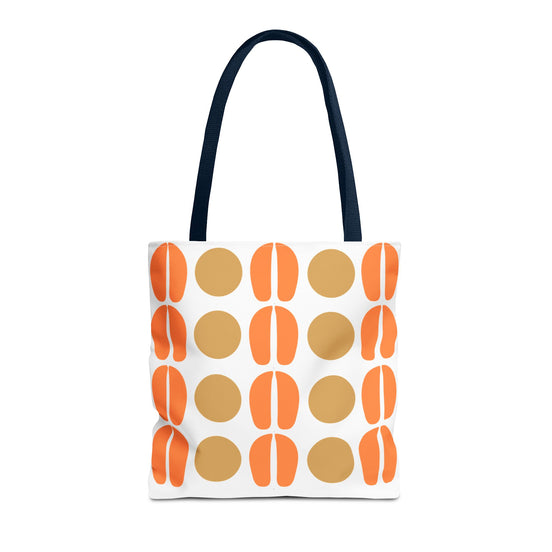 A white canvas tote bag featuring a retro pattern of orange and tan semicircles, with dark navy blue shoulder straps, shown against a plain white background.