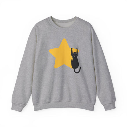 A heather gray crewneck sweatshirt featuring a graphic of a black cat climbing a yellow star on the front, displayed against a solid white background.