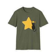 An olive green short-sleeve crewneck t-shirt featuring a graphic of a black cat climbing a large yellow star on the front, displayed against a solid white background.