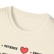 Close-up of an off-white speckled t-shirt showing the inner collar and part of a graphic print with the word 'PATIENCE' and a red heart outline.