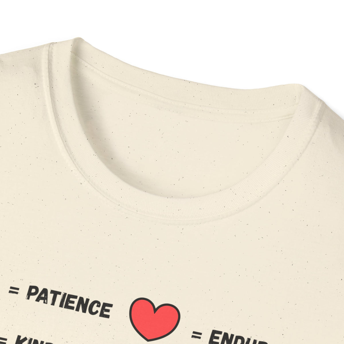 Close-up of an off-white speckled t-shirt showing the inner collar and part of a graphic print with the word 'PATIENCE' and a red heart outline.