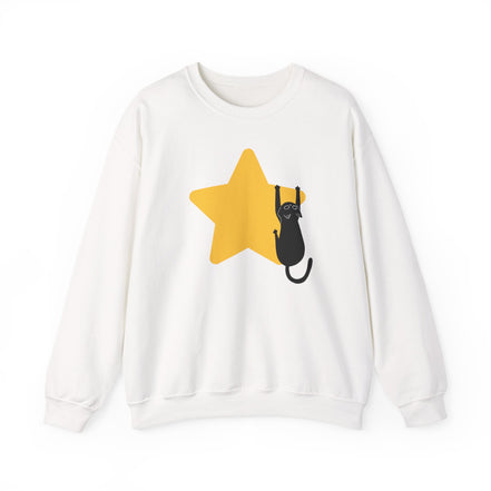 An off-white crewneck sweatshirt featuring a graphic print of a black cat climbing a large yellow star on the front.