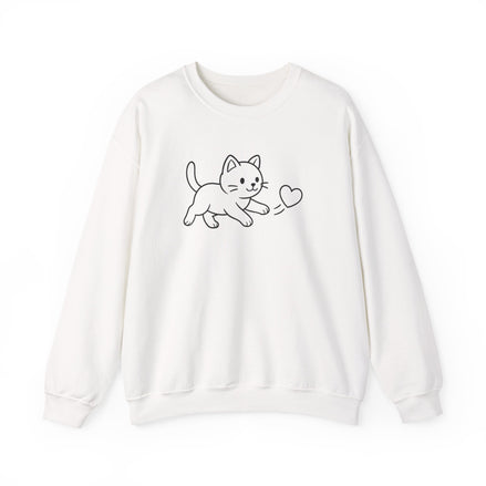 A white  crewneck sweatshirt featuring a simple black line art graphic of a playful kitten chasing  a heart, displayed against a clean white background.