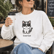 Cool Cat Crewneck Sweatshirt lifestyle photo of a woman with coffee