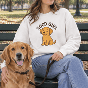 Good Girl Puppy Sweatshirt worn by young woman sitting beside a dog
