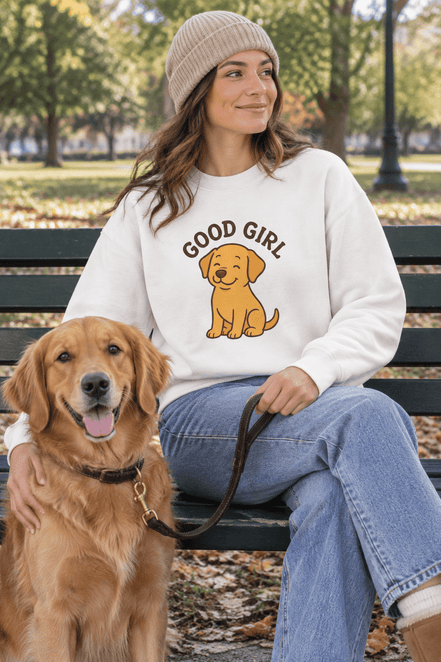 Good Girl Puppy Sweatshirt worn by young woman sitting beside a dog