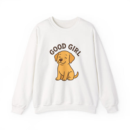 An off-white crewneck sweatshirt featuring a cartoon graphic of a golden retriever puppy sitting underneath the brown text 'GOOD GIRL'.